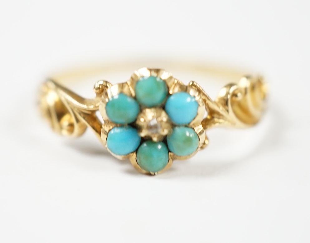 A late Victorian yellow metal, turquoise and rose cut diamond set flower head cluster ring, size L, gross weight 1.4 grams. Condition - fair, band mis-shapen